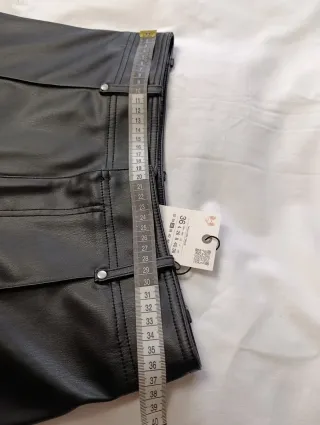 Pantalones wide leg efecto piel