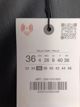 Pantalones wide leg efecto piel