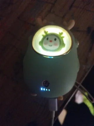 Calentador de manos/linterna con funda