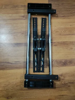 Soporte TV  está 60 pulgadas casi nuevo