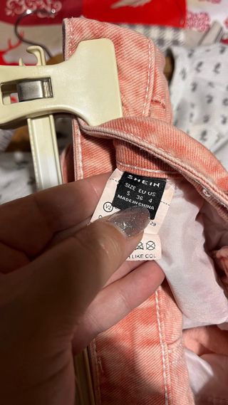 Jeans donna rosa strappati