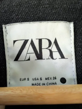 Cazadora vaquera gris con flecos