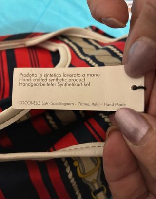 Borsa Coccinelle a righe rosse e nero