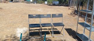 Sedie pieghevoli nere e argentate