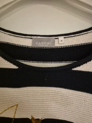 Blusa de rayas con estrellas bordadas