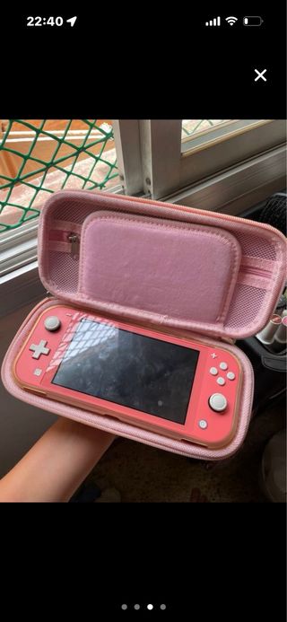Nintendo Switch Lite Coral con funda