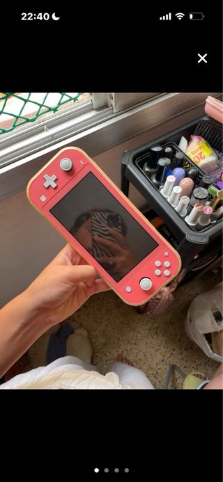 Nintendo Switch Lite Coral con funda