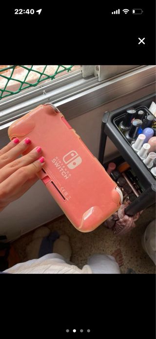 Nintendo Switch Lite Coral con funda
