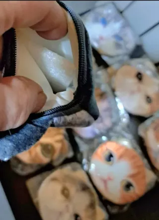 9 borsellini portamonete a forma di gatto diversi