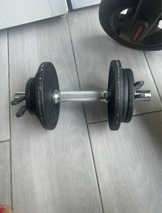 Barra de pesas con discos