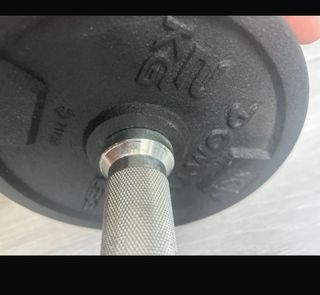 Barra de pesas con discos