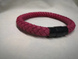 Pulsera trenzada piel artesanal fucsia