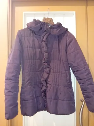 Piumino donna nero con rouches