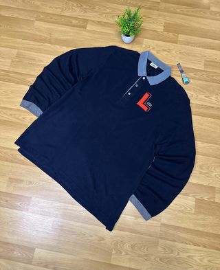Polo Lacoste manga larga azul talla L