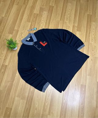 Polo Lacoste manga larga azul talla L