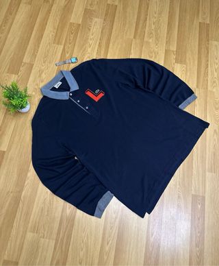 Polo Lacoste manga larga azul talla L