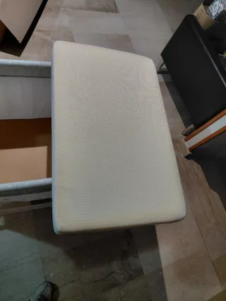 Minicuna bebé con osito y estrellas