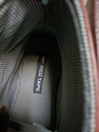 Botas de cuero marrones con cordones