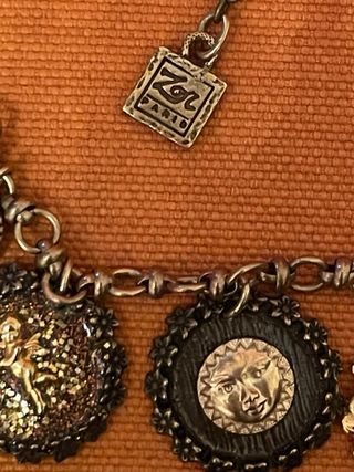 Zor Paris collana e bracciale dorato con charms