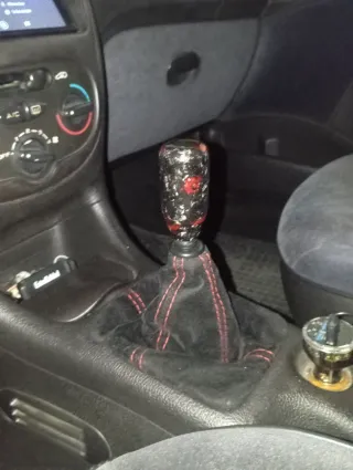 Pomo de cambio universal