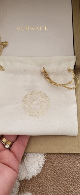 Reloj Versace Dorado y Rojo