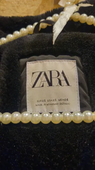 Abrigo plumífero Zara con cinturón