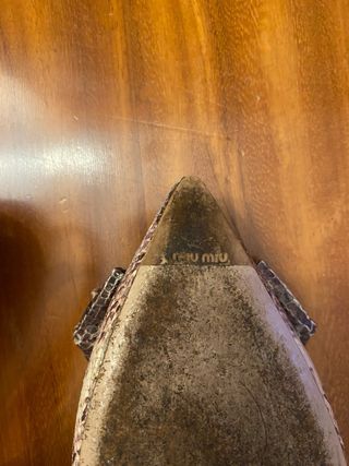 Décolleté Miu Miu con fiocco pitone