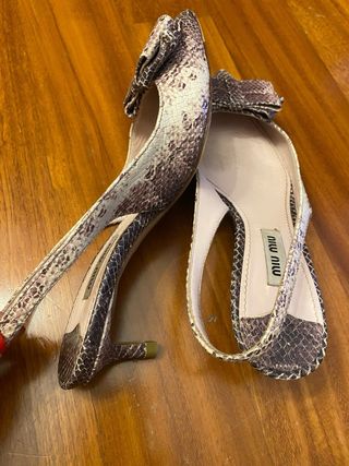 Décolleté Miu Miu con fiocco pitone