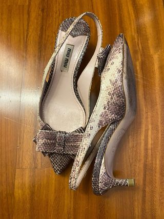 Décolleté Miu Miu con fiocco pitone