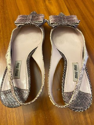 Décolleté Miu Miu con fiocco pitone