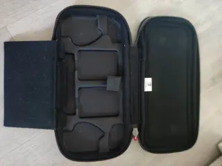 Nintendo Switch Lite Gris con funda