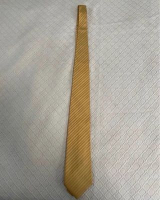 Corbata Loewe dorada