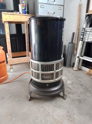 estufa de gas butano vintage con plato de cocinar.