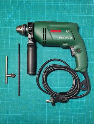 Taladro/percutor BOSCH PSB 600-2 + maletín +brocas