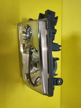 FARO DELANTERO IZQUIERDO NISSAN TERRANO II PLATA