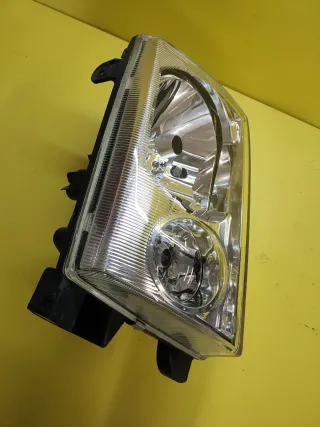 FARO DELANTERO IZQUIERDO NISSAN TERRANO II PLATA