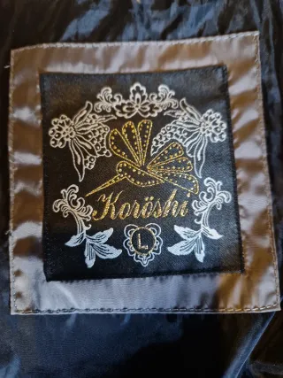 Cazadora acolchada marrón/gris