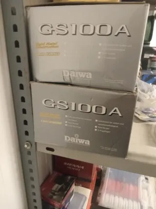 Pareja Carretes pesca Daiwa GS100