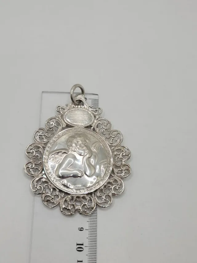 Medallón de Cuna antiguo de Plata