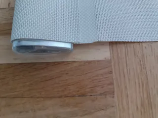 Tenda avvolgibile beige. Termica 5%.