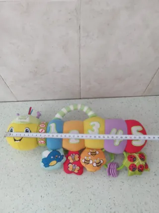 Gusano musical para carrito o silla de bebé