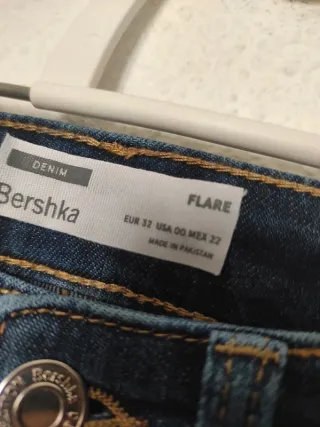 Vaqueros azules de mujer tiro alto flare campana