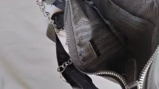 Borsa Prada nera con portamonete e tracolla