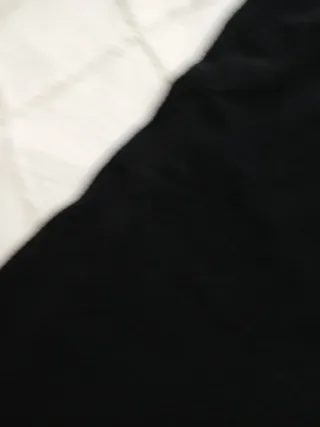 Blusa negra fiesta con plumas Talla L