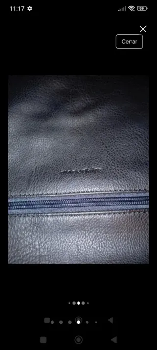 Bolso negro con flecos