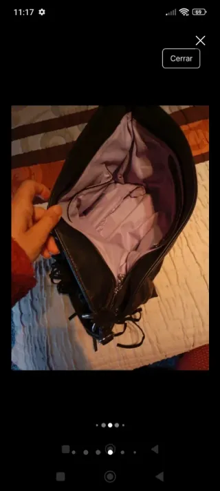 Bolso negro con flecos