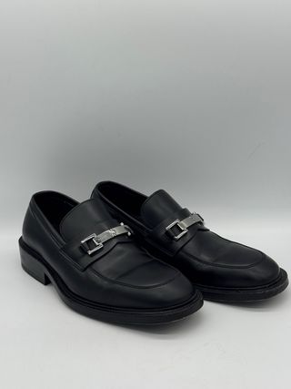 Mocasines Gucci negros con hebilla