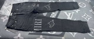 Pantalones Amiri negros desgastados