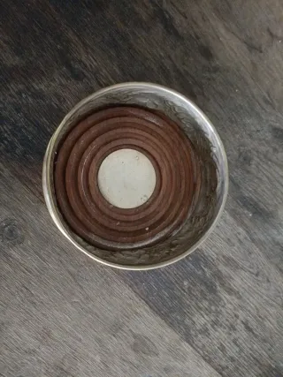 Sotabotellas antiguo con diseño floral