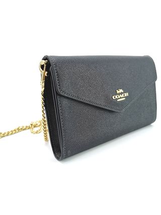 Bolso Clutch Coach Piel Negro
